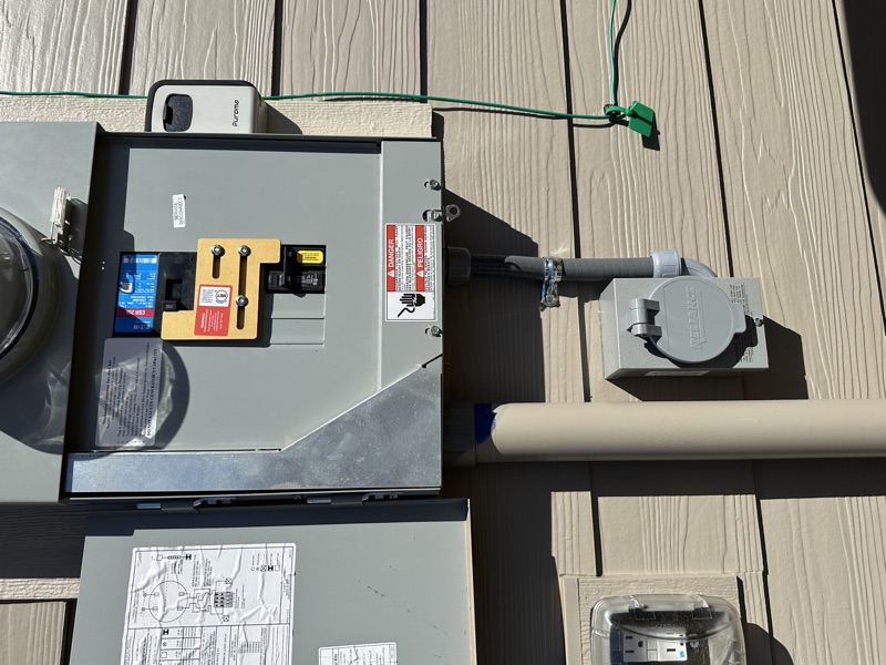 Breaker panel with interlock kit and inlet below