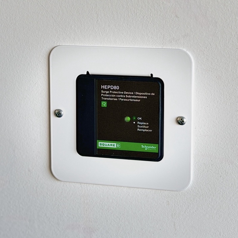 HEPD80 whole-home surge protector installed on interior wall